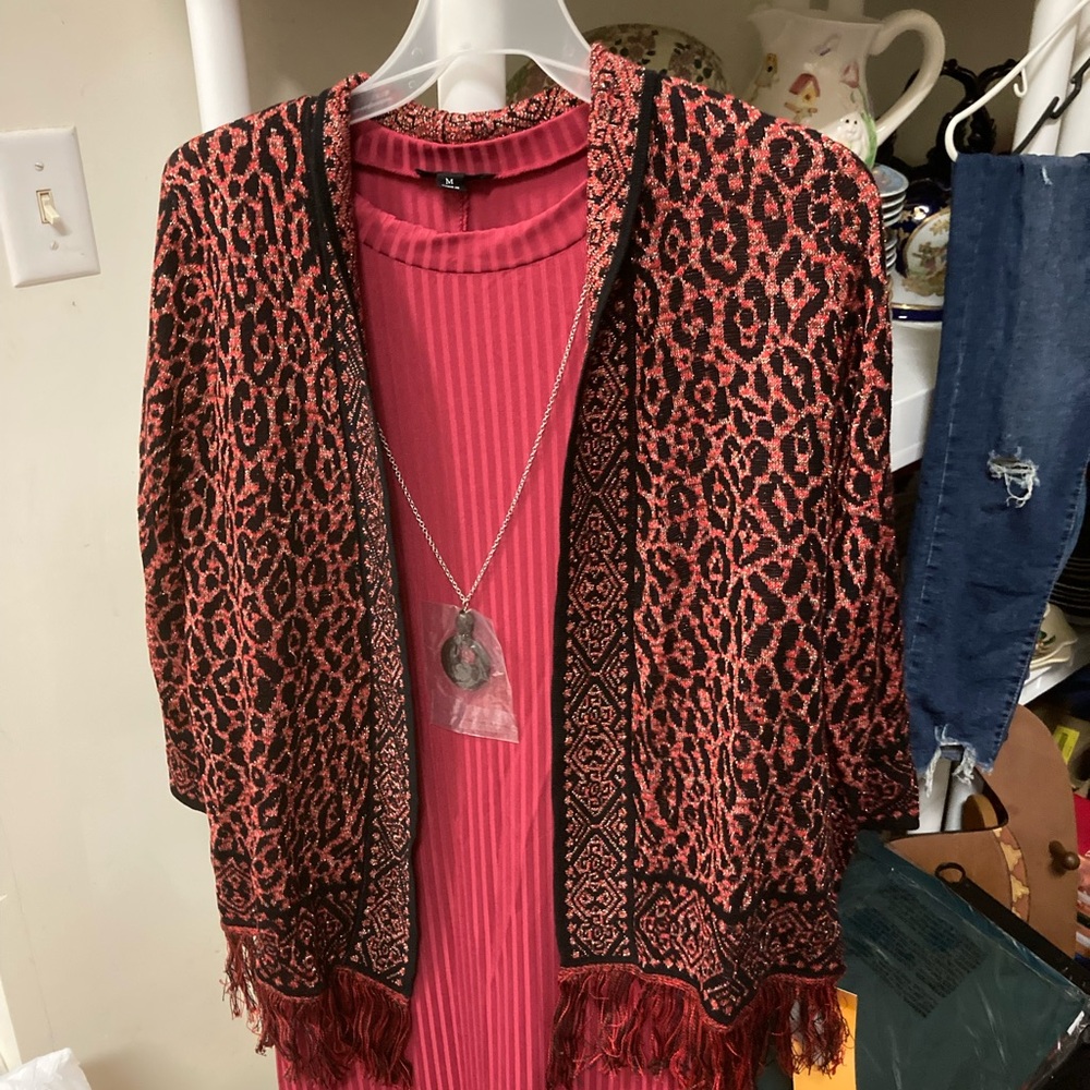 Woman’s dress and sweater